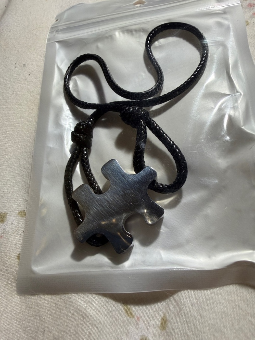Plunder Black Puzzle Piece Cord Bracelet - Picture 4 of 4